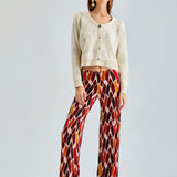 Daisy Cardigan in ivory with intricate embroidery and lightweight, cozy fabric for refined comfort