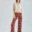 Daisy Cardigan in ivory with intricate embroidery and lightweight, cozy fabric for refined comfort