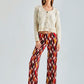 Daisy Cardigan in ivory with intricate embroidery and lightweight, cozy fabric for refined comfort