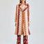 Statement-making pearl jacket with dynamic fringe texture