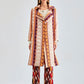 Statement-making pearl jacket with dynamic fringe texture