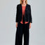 Elegant black jacket featuring subtle floral accents and chic sleeves