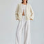 Chic ivory jacket with exquisite floral embroidery and wrist-length sleeves