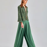 High-rise Gia Pants in green offering comfort and sophisticated style
