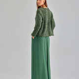 Chic green trousers with wide-leg silhouette and flattering waistband