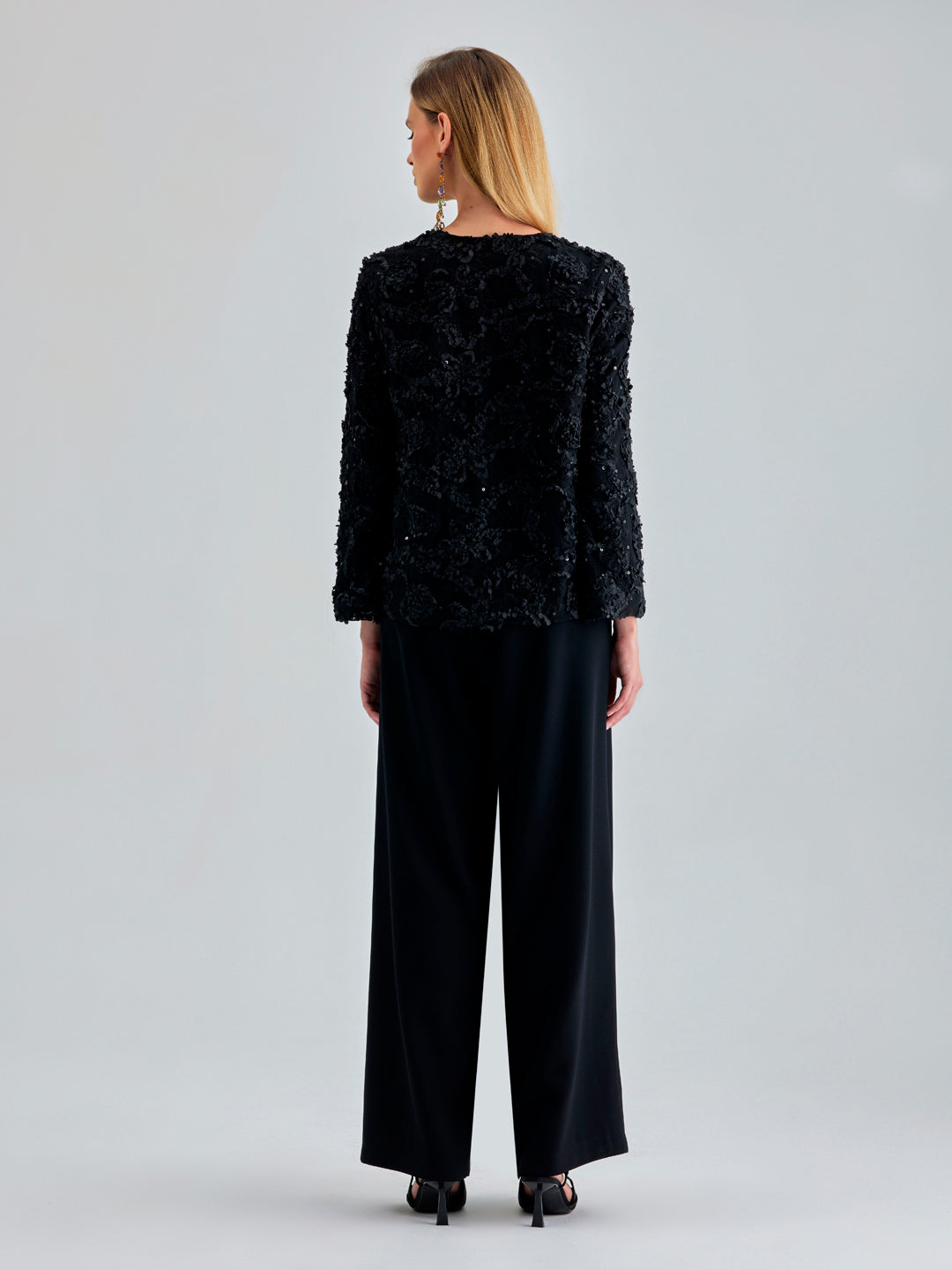 Timeless black jacket with luxurious feel and stylish floral details