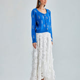 Sophisticated Daisy Cardigan Blue featuring intricate embroidery and a lightweight, elegant design