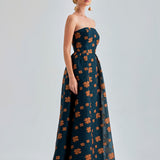 Off-shoulder Sierra Gown Strapless with vibrant paisley prints and flowing maxi skirt