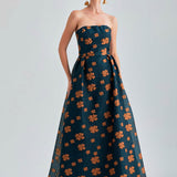 Sierra Gown Strapless featuring vibrant paisley and floral patterns with an off-shoulder design