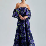 Zelene Gown Violet with large-scale floral patterns and a rich violet hue, featuring a daring open back