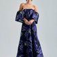Zelene Gown Violet with large-scale floral patterns and a rich violet hue, featuring a daring open back
